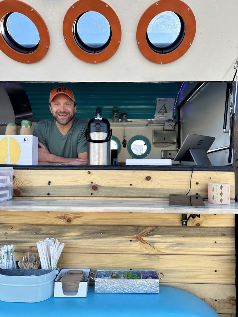 Taylor Kirkman in the Coffee Caboose. Open for business
