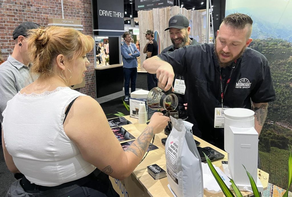 Midnight Coffee Roasting brewing at World of Coffee 2026